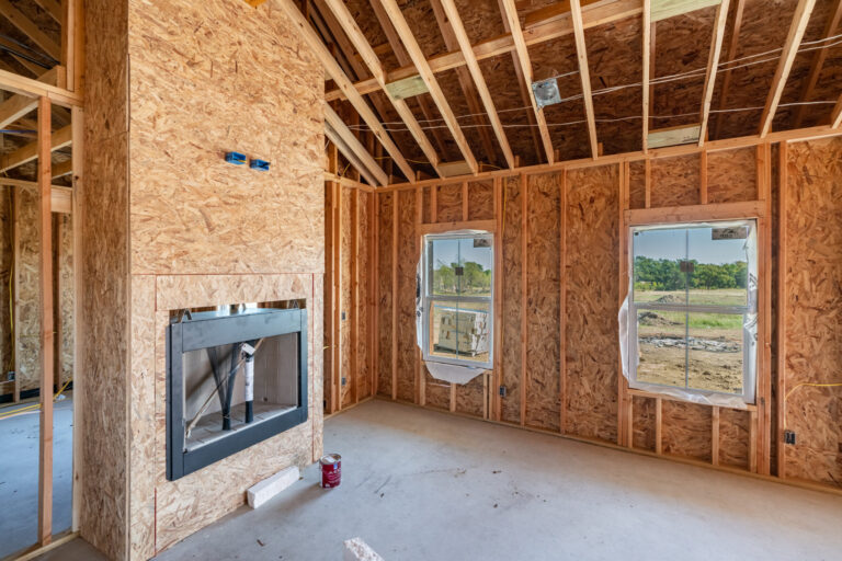 framed out walls and fireplace