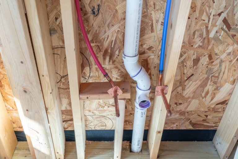 plumbing in exposed wall