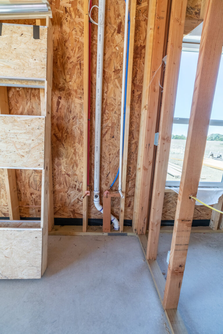 plumbing in exposed wall